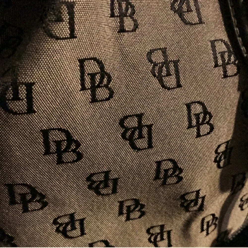 Vtg Dooney & Bourke signature monogram canvas leather backpack
